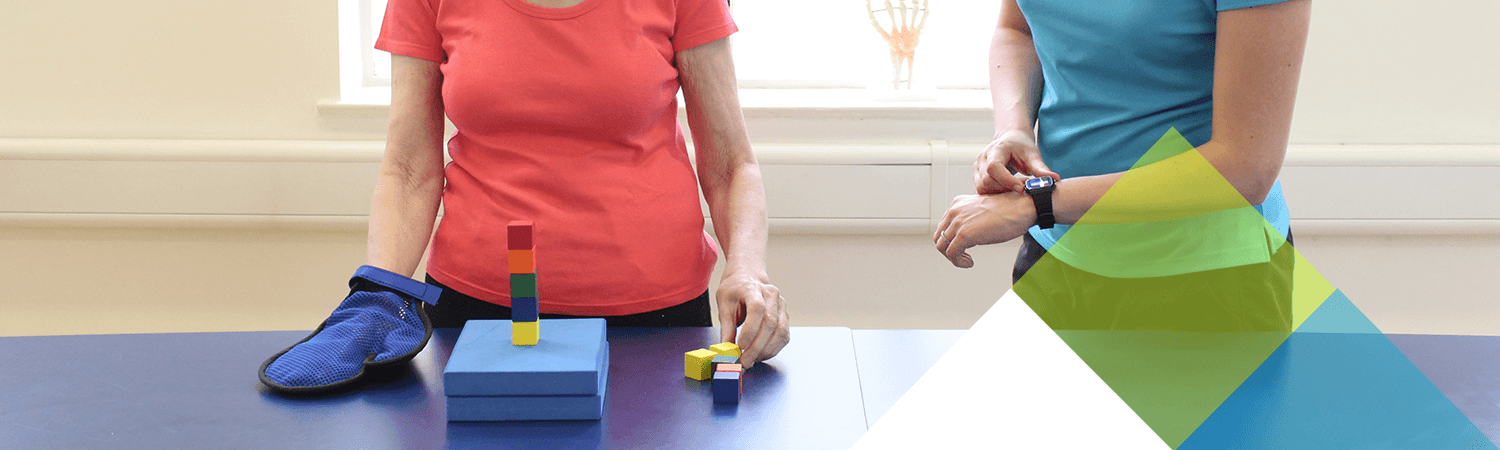 The constraint mitt used during physical task with patient The constraint mitt used during physical task with patient