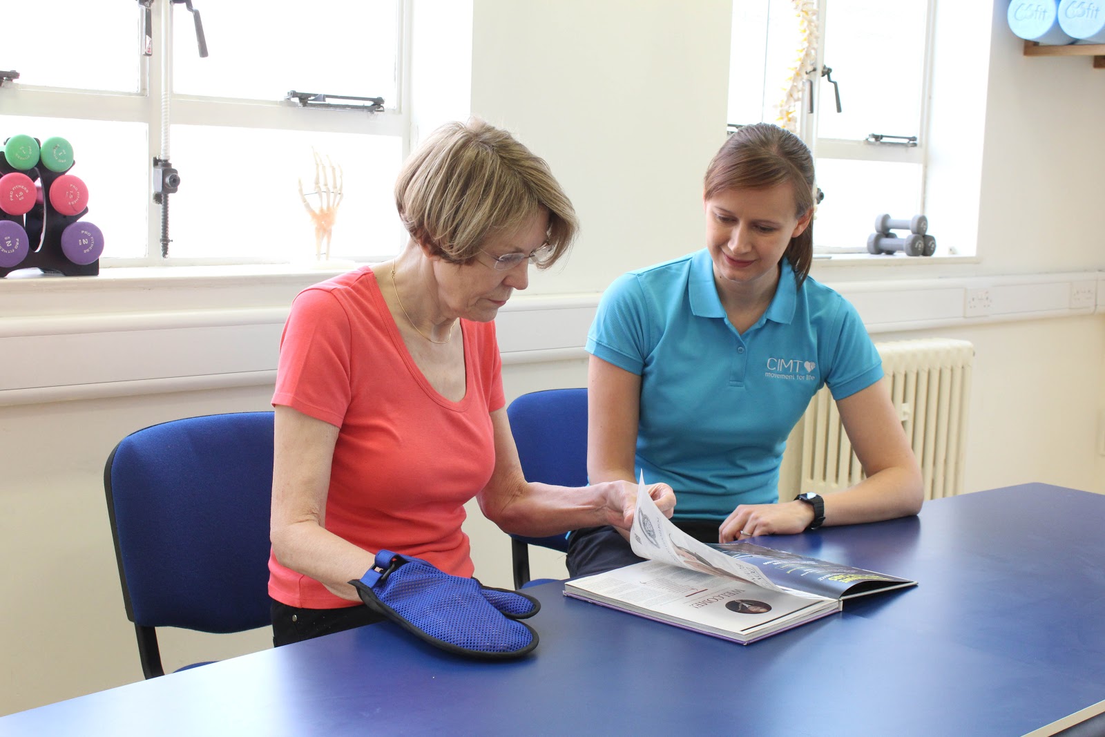 Therapist interacting with patient