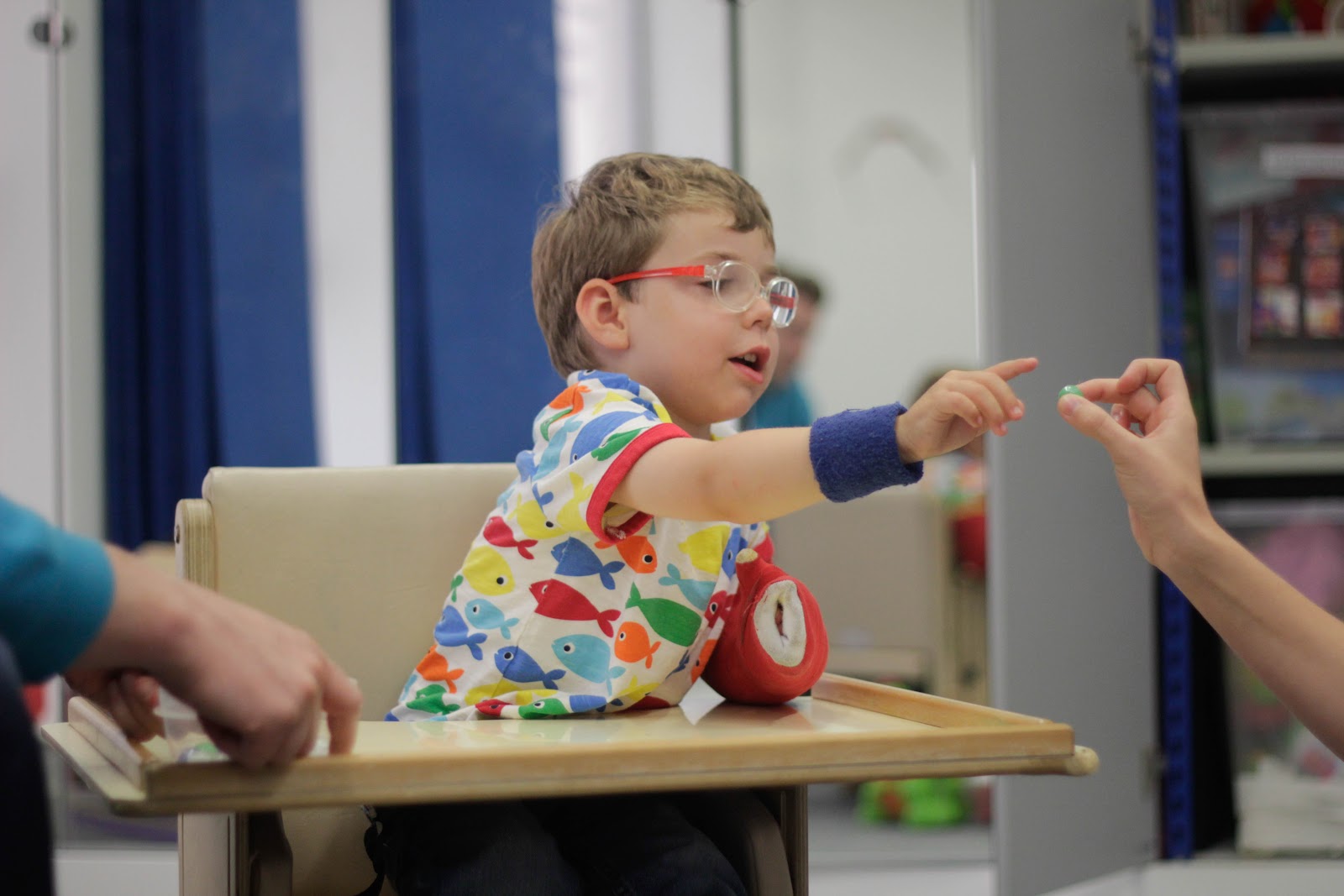 George interacting with CIMT therapist