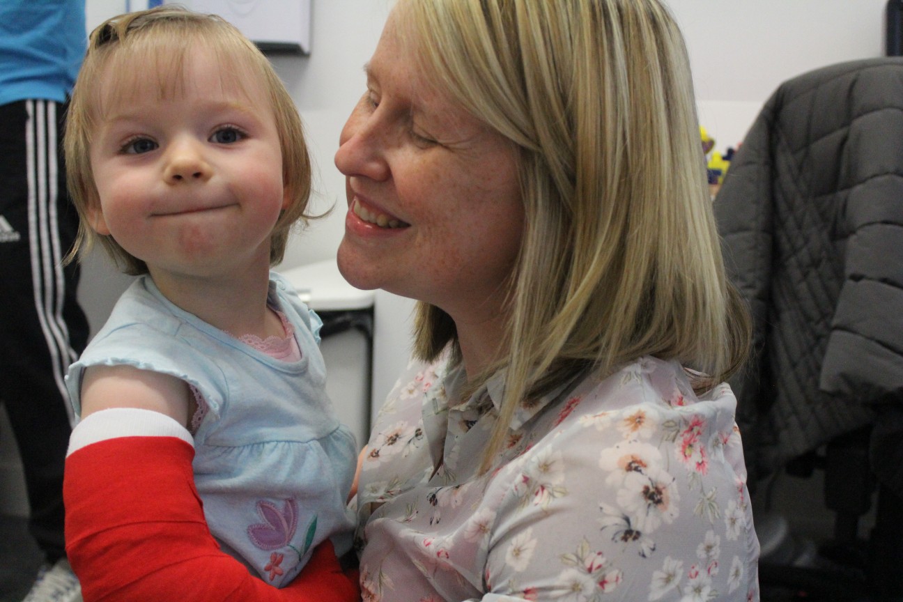 Leah saying goodbye to CIMT therapist