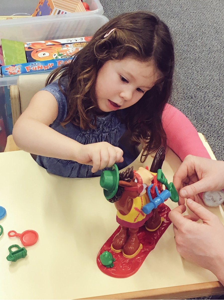 Harvey removing bricks from jenga tower using least dominant hand