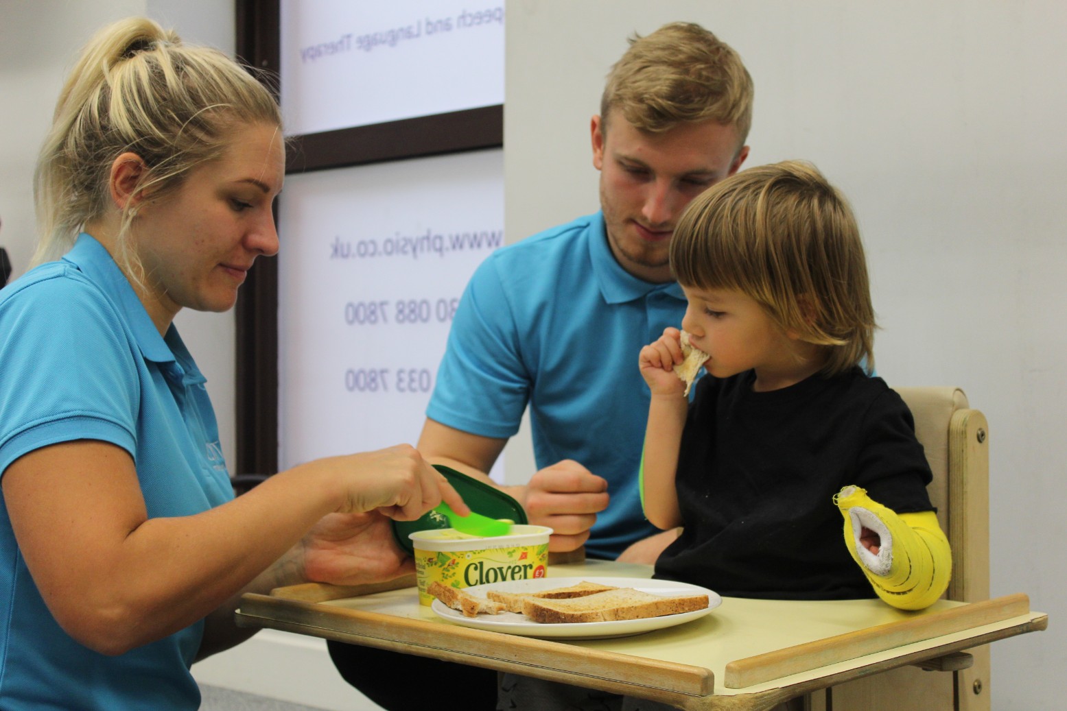 Reggie playing with toys during CIMT treatment